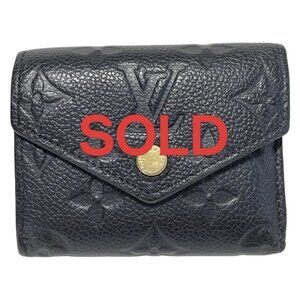 LOUIS VUITTON Portefeuille Zoe Noir Monogram Empreinte - 434-061325